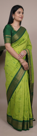 Load image into Gallery viewer, Woman wearing a green saree with a gold border in a collage format.