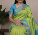 Load image into Gallery viewer, Collage of a woman wearing a green and blue saree with a plant in the background