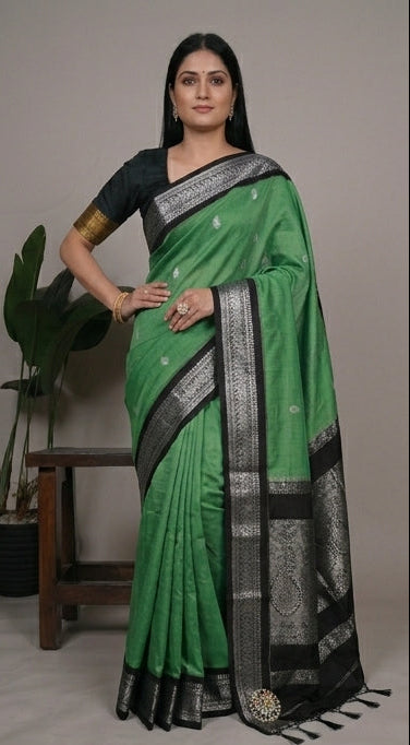 Green and black saree with silver border worn by a woman, displayed from different angles.