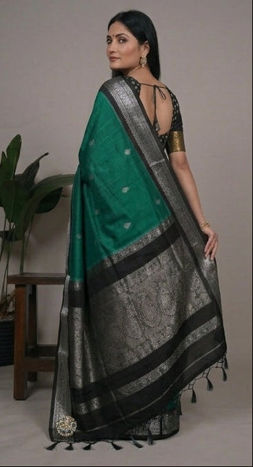 Green and black saree with silver border displayed in multiple poses on a neutral background.