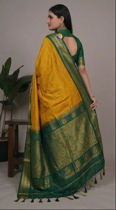 Yellow saree with green border displayed from multiple angles on a neutral background.