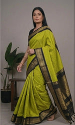 Load image into Gallery viewer, Green saree with black border worn by a model in various poses.