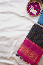 Load image into Gallery viewer, Traditional saree with gold patterns on a white fabric background