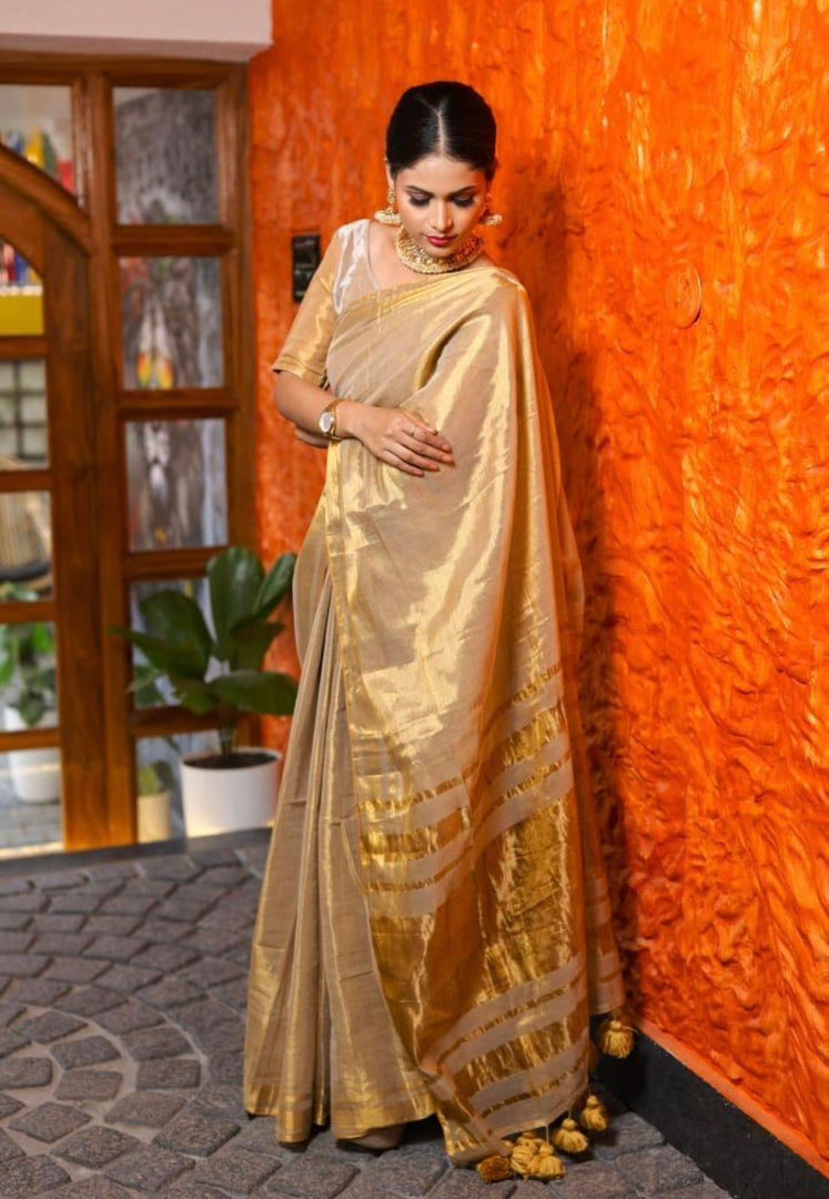 Kanakambika - കനകാംബിക (Premium Tissue Kerala Saree)